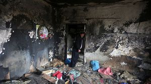 مستوطنون كانوا قد أحرقوا منزل عائلة دوابشة عام 2015 ما أدى إلى استشهاد والدين وطفلهما الرضيع- جيتي