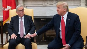 ترامب قال بعد اجتماع مع رئيس المفوضية الأوروبية جان يونكر إنهما اتفقا على خفض الحواجز التجارية- جيتي