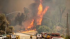 حريق "كار" دمر 500 مبنى وأتى على أكثر من 19400 هكتار من الأراضي- جيتي 