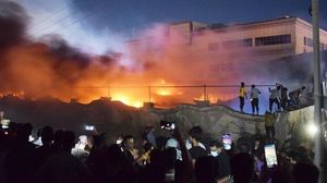 ارتفاع ضحايا حريق مستشفى كورونا في بغداد إلى 64 قتيلا و8 مفقودين- (الأناضول)