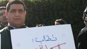 المستشار محمد الهيني في وقفة احتجاجية - عربي21