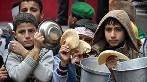 الفصائل الموالية للنظام تتسبب في مزيد من المعاناة لسكان مخيم اليرموك المحاصر - أرشيفية