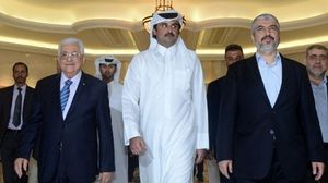حماس قطر عباس مشعل تميم - أ ف ب