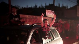 احتفال أهالي غزة بالنصر  - الأناضول
