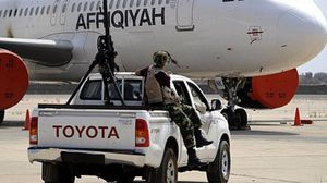 عناصر من قوات فجر لبيبا في مطار طرابلس - أرشيفية