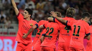 لاعبو برشلونة يحتفلون بالتسجيل في مرمى نيس في 2 اب/اغسطس 2014- ا ف ب