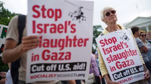 محتجون على العدوان الإسرائيلي على غزة أمام البيت الأبيض - أ ف ب 