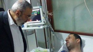 عمران الزعبي وزير إعلام النظام السوري يزور حسين مرتضى بالمستشفى - تويتر
