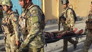 طالبان أسرت 40 جنديا واستولت على دبابات داخل القاعدة- جيتي