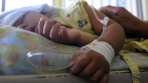 طفل مصاب بحمى الضنك في هندوراس – أ ف ب