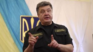  الرئيس الأوكراني، بيترو بوروشينكو في مؤتمر صحفي - أ ف ب