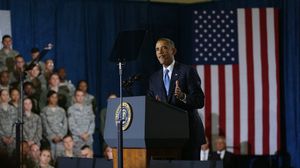 أوباما يتحدث خلال زيارته للقيادة المركزية الأمريكية في قاعدة ماكديل - أ ف ب
