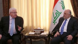 رئيس الوزراء العراقي حيدر العبادي في لقائه مع الرئيس فؤاد معصوم - أ ف ب