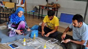  ورشة لتعليم الرسم بالفسيفساء في مخيم "أدي يامان" - الأناضول