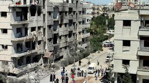 أهالي حي الوعر يفرغون المدارس في حمص (أرشيفية) - الأناضول
