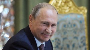 قال بوتين إن بلاده ستواصل دعم الأسد عسكريا - أ ف ب