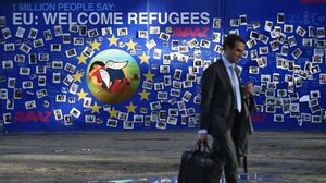 أقر وزراء الاتحاد الأوروبي توزيع 40 ألف لاجئ دون تفاصيل التوزيع - أ ف ب