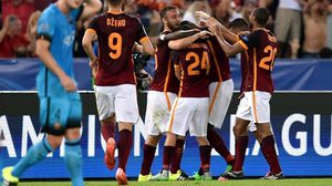 لاعبو روما يحتفلون بتسجيل فلورينزي هدفهم الوحيد - أ ف ب