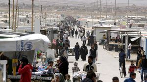 اللاجئون السوريون يحتاجون المساعدات المالية والصحية في مخيمات اللجوء - أ ف ب