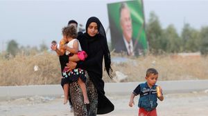 نازحون عراقيون فروا إلى سورية هربا من العنف في الموصل- رويترز