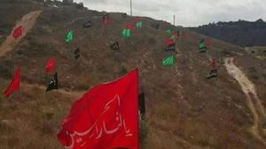 رايات شيعية نصبها حزب الله في مناطقه بلبنان - تويتر