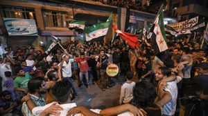 سكان إدلب أقاموا احتفالات أمس بعد الإعلان عن الاتفاق- جيتي