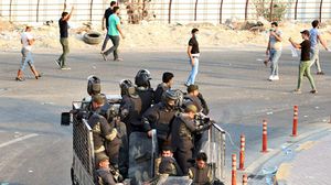 الحكومة العراقية تقول إن مندسين بين المحتجين يعملون على تخريب الممتلكات العامة- جيتي