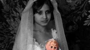 تجمعت ناشطات نسويات قي مظاهرة لرفض الموافقة على زواج الطفلة إسراء- أرشيفية