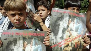 راح ضحية المجزرة المئات من المدنيين بينهم نساء وأطفال- جيتي