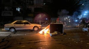مواجهات في الشوارع بين محتجين وقوات الأمن الإيراني- جيتي