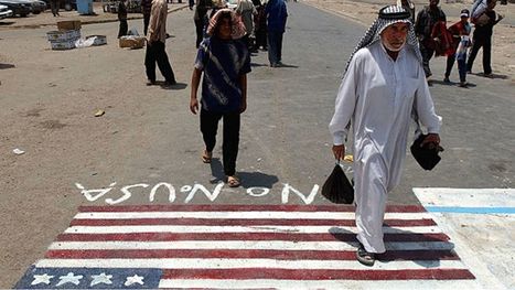 إهانة العلم الأمريكي في بغداد.. هل هي رسالة إيرانية واضحة إلى واشنطن؟