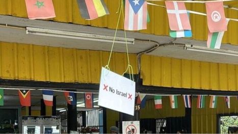 بائعة في كمبوديا تطرد سياح الاحتلال من محلها (شاهد)