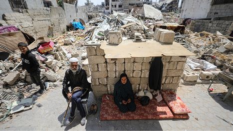 فلسطينيون بغزة يقهرون الدمار ويعودون للسكن على ركام منازلهم (شاهد)