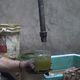 وقود الحصار - وقود من حرق مواد بلاستيكية - مخيم اليرموك - سوريا - عربي21 (1)