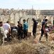 دفن قتلى القصف الجوي على حلب - حي القاطرجي - رويترز