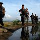 ضباط شرطة بورميون في ولاية راكين الروهينغا - أسوشيتد برس
