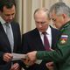 يوتين ووزير الدفاع الروسي الأسد - أ ف ب