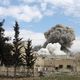 الطيران السوري يقصف مدينة حلب بالصورايخ - أ ف ب