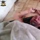 جثة القتيل الإيراني في يد ألوية الفرقان - يوتيوب
