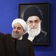 الرئيس الإيراني روحاني وفي الصورة خامنئي - جيتي