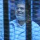 مرسي خلال إحدى محاكماته - أرشيفية