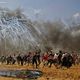 فلسطينيون في اشباكات مع جيش الاحتلال في غزة - جيتي