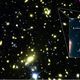 صورة التقطها التسلكوب "هابل" ونشرتها جامعة "يونيفرسيتي كوليدج لندن" تظهر المجرة "ماكس1149-جاي جي 1" 