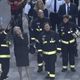تيريزا ماي في زيارة لموقع حريق "غرنفيل تاور" في لندن - أ ف ب