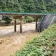انهيار جسر في الصين جراء الفيضانات- شينخوا