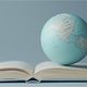 الكرة الأرضية وسط كتاب..صورة لمقال