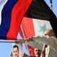 مؤيدون للنظام السوري يرفعون علم النظام السوري وروسيا - أرشيفية