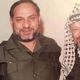الحسيني في صورة تاريخية مع زعيم حركة فتح الراحل ياسر عرفات- أرشيفية