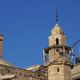 مأذنة مسجد كاتب ولاية التاريخي يعانق الكنيسة